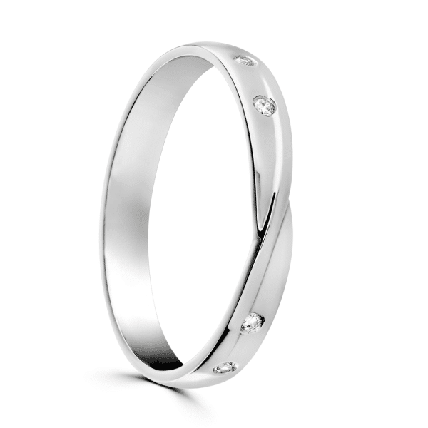 Bow tie shaped ring with bezel set brilliants in 18ct white gold